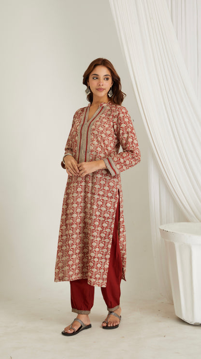 Woman wearing red hand block print cotton kurta with V-neck and 3/4 sleeves – front view