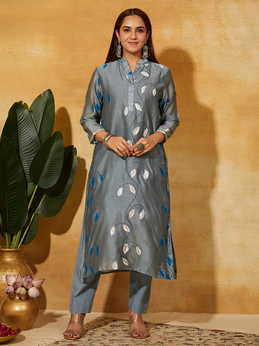 Front view of grey hand painted chanderi silk suit wearing by Meeta's