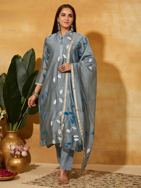 Woman wearing a grey traditional festive salwar suit with floral patterns  wearing by Meeta's