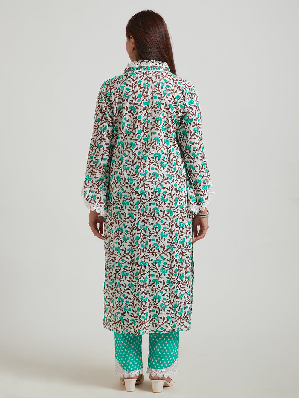 Women’s printed kurta set with green pants, back view