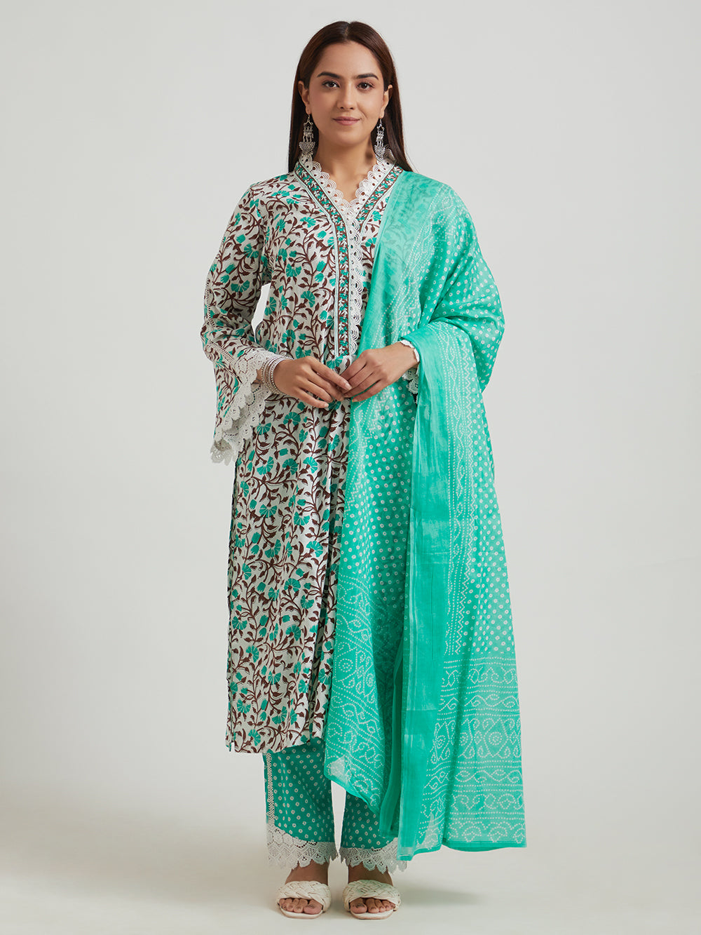 Women wearing printed ethnic suit set with green pants and matching dupatta-front view”
