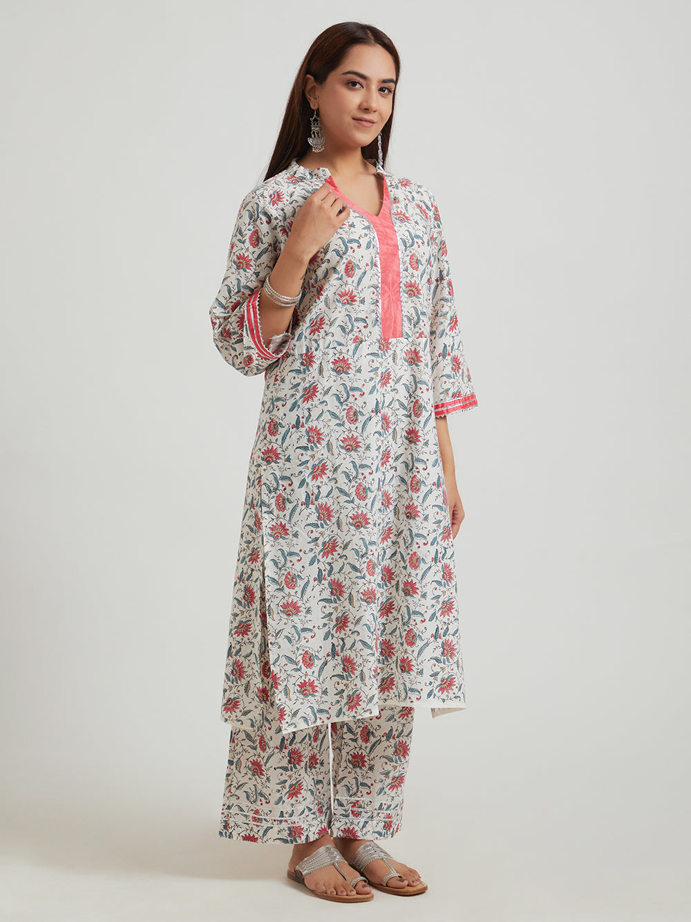 Multicolour hand block printed cotton suit set Side view with kurta and pants .